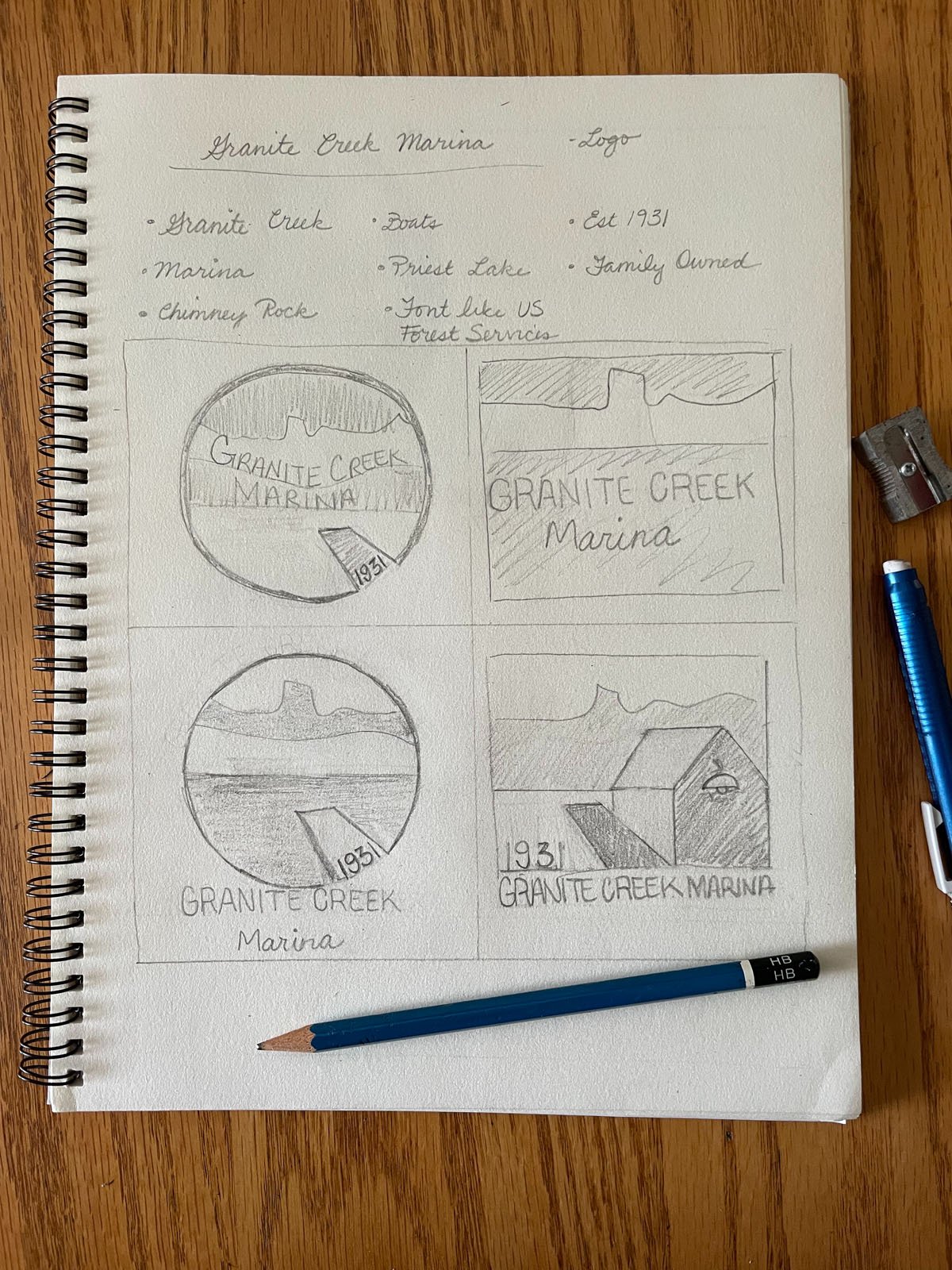 Sketchbook of logo drawings.